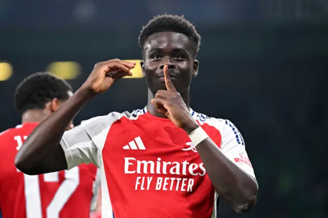 Bukayo Saka celebrates