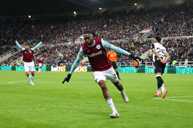 Aaron Wan-Bissaka celebrates after scoring against Newcastle