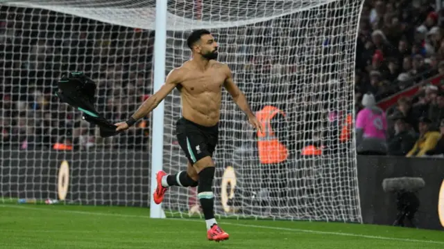 Mohamed Salah celebrates after scoring for Liverpool