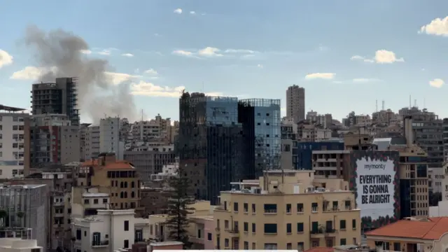 Smoke rises over Beirut following a strike in the city.