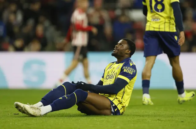 Josh Maja sits on the ground