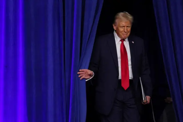 Republican presidential nominee and former U.S. President Donald Trump takes the stage for his election night rally at the Palm Beach County Convention Center in West Palm Beach, Florida, U.S., November 6, 2024.