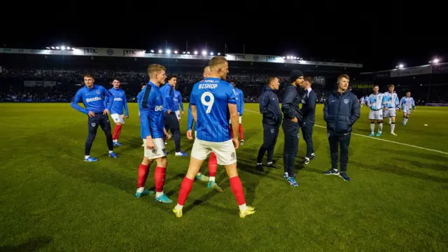 Portsmouth players on pitch