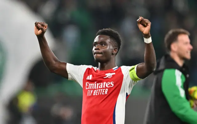 Bukayo Saka celebrates after Arsenal's win over Sporting