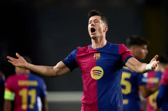 Robert Lewandowski celebrates during Barcelona's win over Brest