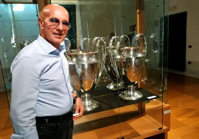 Arrigo Saachi with Champions League trophies at AC Milan