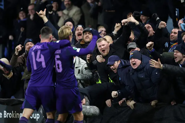 Fans of Djurgarden celebrate after Tobias Gulliksen