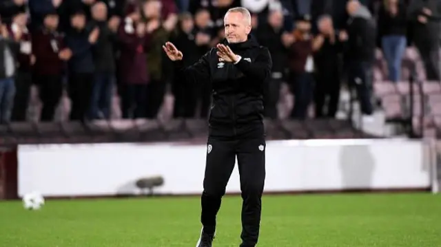 Neil Critchley, Head Coach of Heart of Midlothian FC reacts