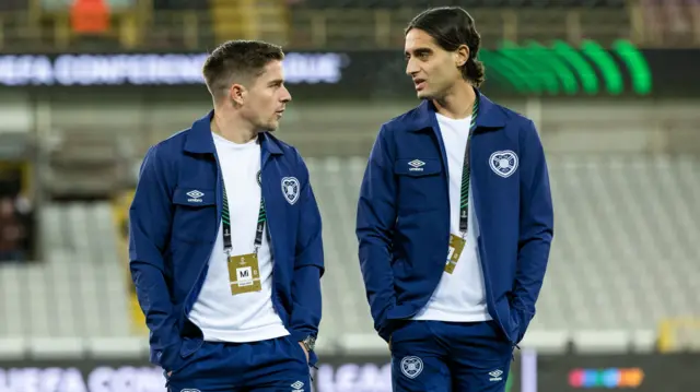 Hearts' Cammy devlin (L) and Yan Dhanda arrive ahead of a UEFA Conference League 2024/25 League Phase MD4 match between Cercle Brugge and Heart of Midlothian at the Jan Breydel Stadium