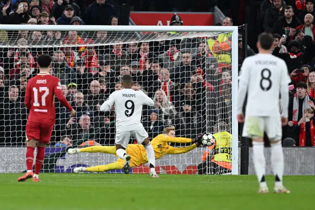 Caoimhin Kelleher saves Kylian Mbappe's penalty