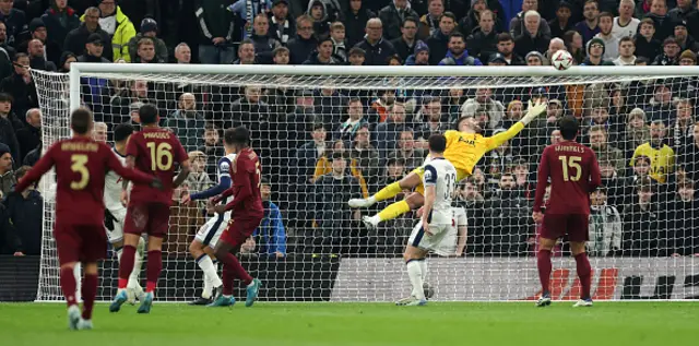 Evan Ndicka of AS Roma scores