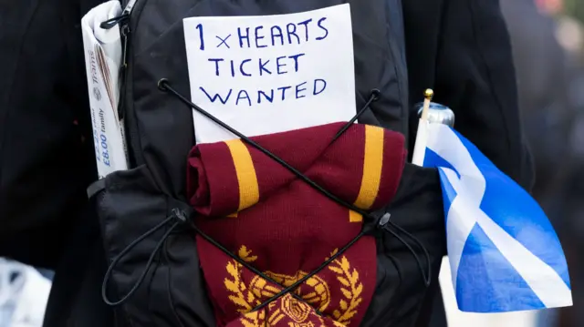 A fan looking for a ticket before a UEFA Conference League 2024/25 League Phase MD4 match between Cercle Brugge and Heart of Midlothian at the Jan Breydel Stadium