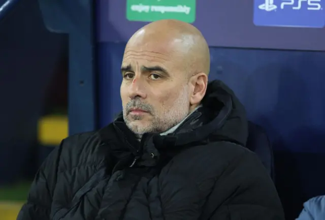 Pep Guardiola looks dismayed