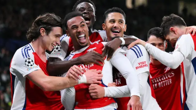 Arsenal players celebrate with goalscorer Gabriel