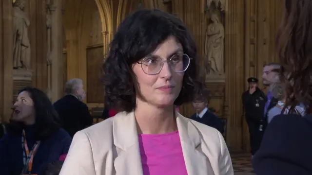 Layla Moran speaks to the BBC, with Parliament's central lobby clearly visible in the background