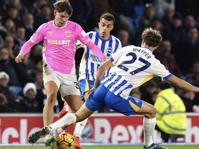 Southampton's Tyler Dibling and Brighton and Hove Albion's Mats Wieffer battle for the ball