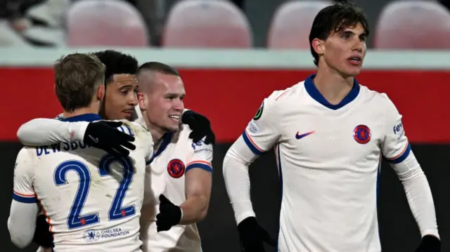 Jadon Sancho celebrates with his Chelsea team-mates