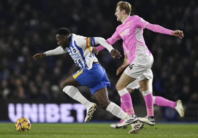 Brighton & Hove Albion's Danny Welbeck in action with Southampton's Flynn Downes