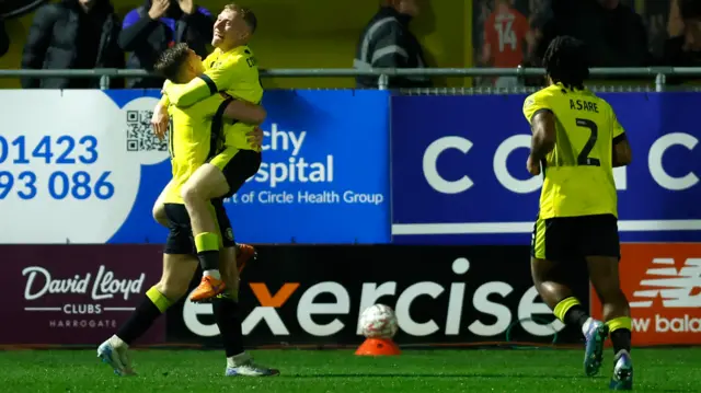 Dean Cornelius celebrates his goal for Harrogate Town