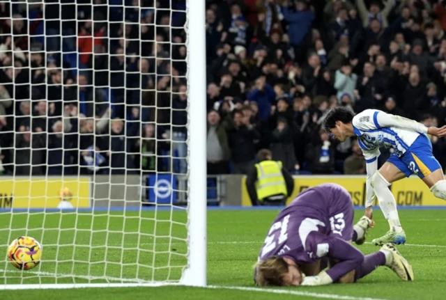 Brighton and Hove Albion's Kaoru Mitoma scores their side's first goal