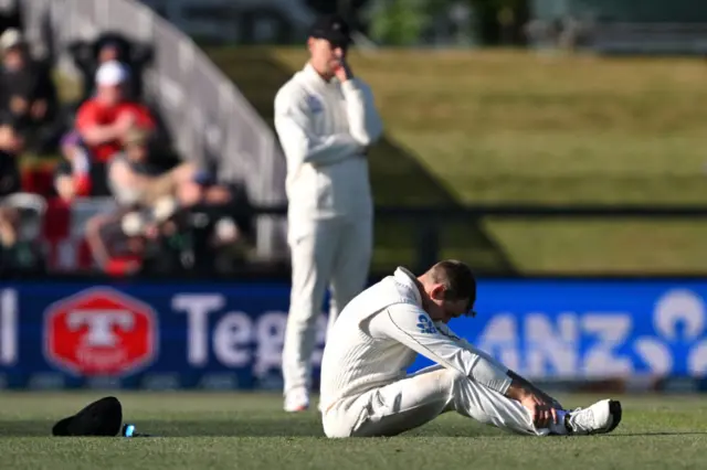 Tom Latham shows frustration after dropping a catch