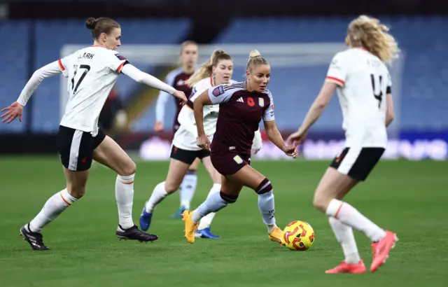 Adriana Leon of Aston Villa runs with the ball