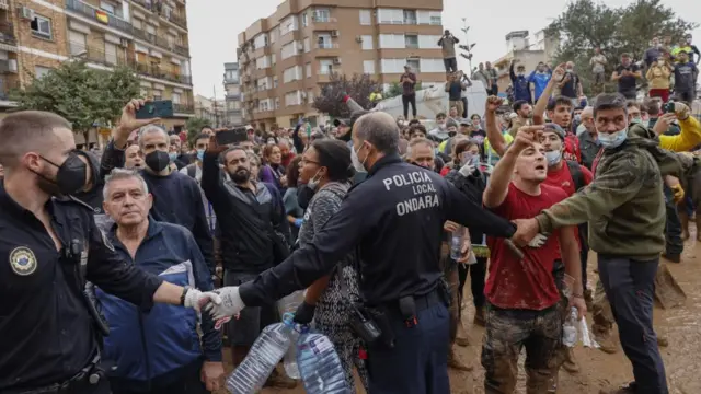 Angry citizens shout insults at the Spanish king and government officials as they paid their first visit to Paiporta