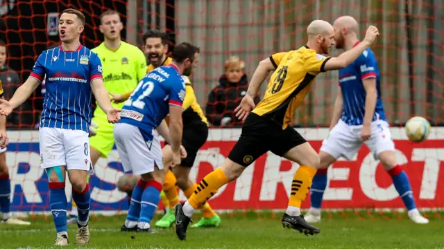 Joe Crowe celebrates after putting Carrick ahead at Taylors Avenue