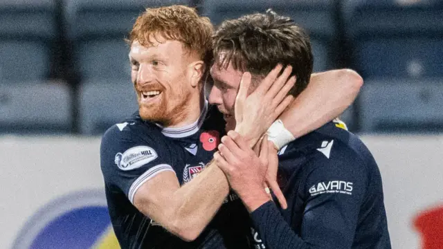 Dundee's Jordan McGhee celebrates with Simon Murray