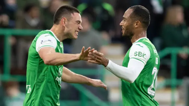 Hibernian's Lewis Miller and Jordan Obita celebrate