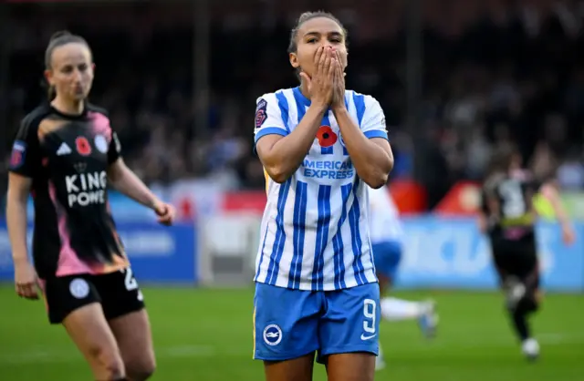 Parris puts her hand to her face as she missed a golden chance