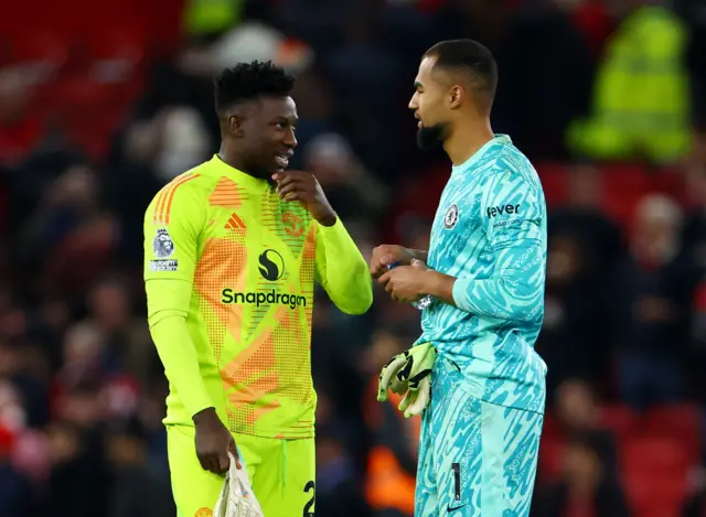 Manchester United's Andre Onana and Chelsea's Robert Sanchez after the match