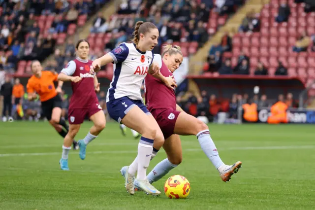 Morris runs down the wing with the ball