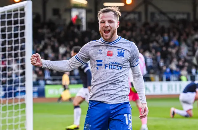 Bruce Anderson celebrates giving Kilmarnock the lead at Dens Park