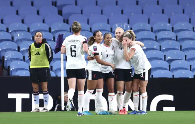 Taylor Hinds celebrates with her Liverpool team-mates