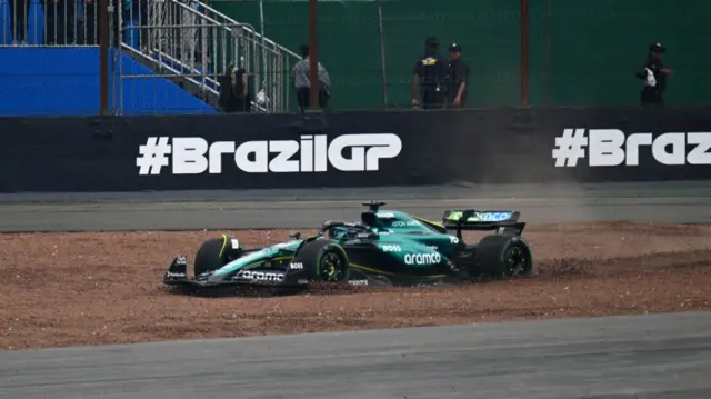 Lance Stroll's car in the gravel