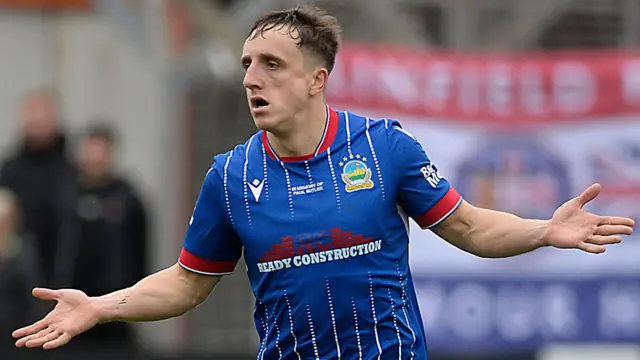 Joel Cooper celebrates after putting Linfield ahead two minutes after Kyle McClean had equalised for the Blues