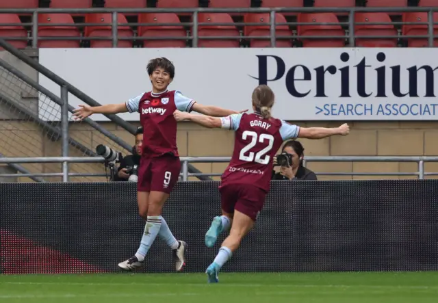 Ueki wheels away to celebrate in the corner with Gorry