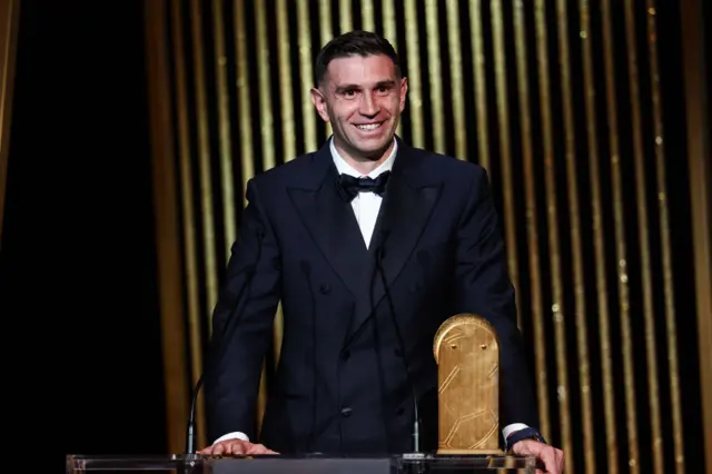 Emiliano Martinez receives the Yashin Trophy for best goalkeepe