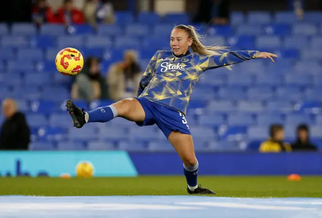 Maisie Settle tries to control the ball in the warm up