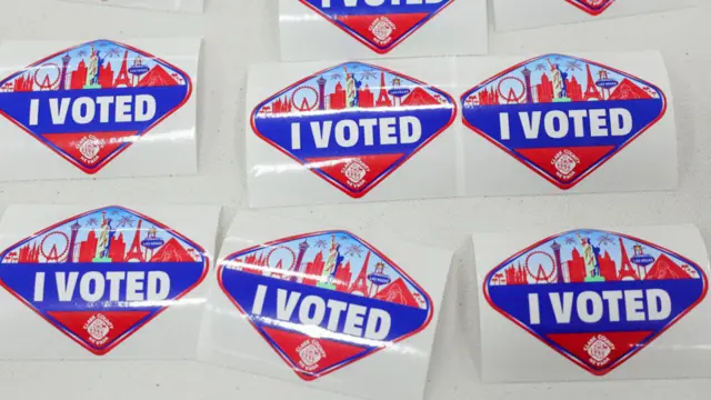 Diamond-shaped stickers with red, white and blue feature the outlines of various Las Vegas landmarks and hotels and the text "I voted"