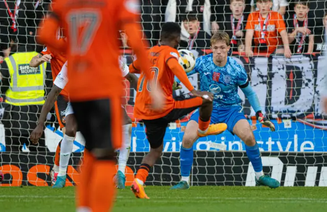 Meshack Ubochioma scores for Dundee United against Hibernian