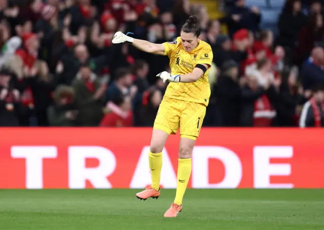 Laws punches the air to celebrate a Liverpool goal