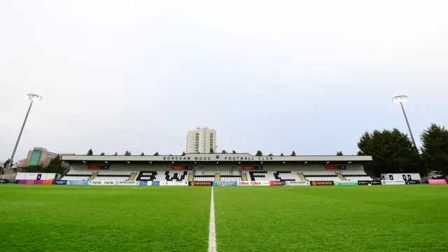 Meadow Park Football Stadium at pitch level from the halfway line