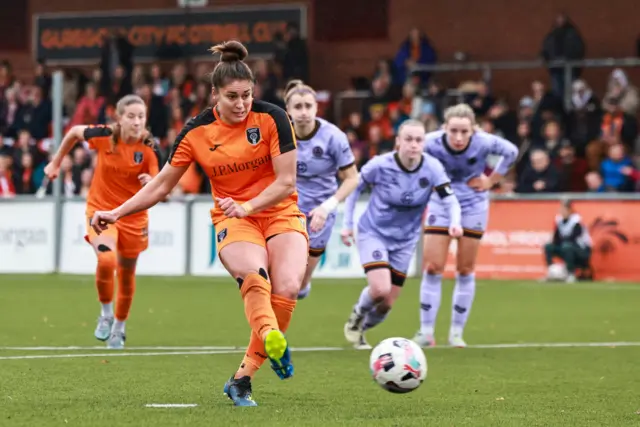 Brenna Lovera scores a penalty for Glasgow City