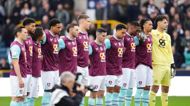 Burnley line up in Remembrance pause