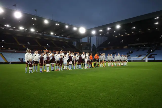 Players line up before the pre match handshake