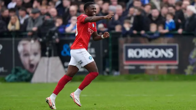 Wycombe goalscorer Beryly Lubala celebrates