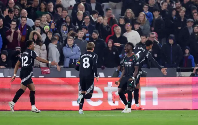 Arsenal's Gabriel Magalhaes celebrates scoring their first goal.