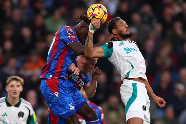 Trevoh Chalobah of Crystal Palace competes for the ball with Joelinton